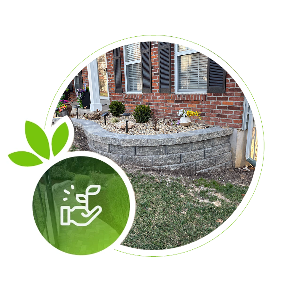 Front yard raised stone flower bed with shrubs in Kirkwood